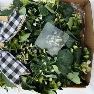 Artificial Greenery Wreath with Black and White Bow